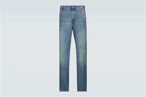 jeans macchiati di erba gucci